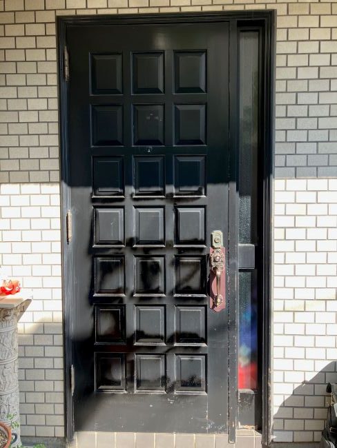 玄関 扉 荒れ