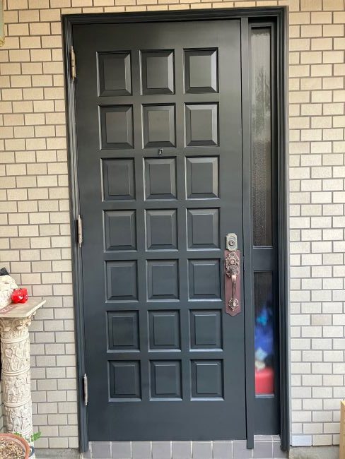 玄関 扉 荒れ